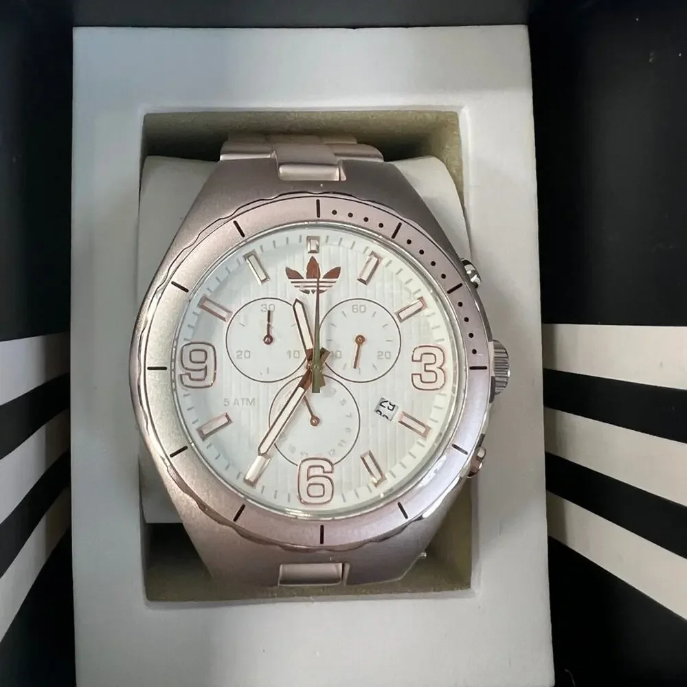 Adidas Metallic rose gold tone Watch with White and gold dial